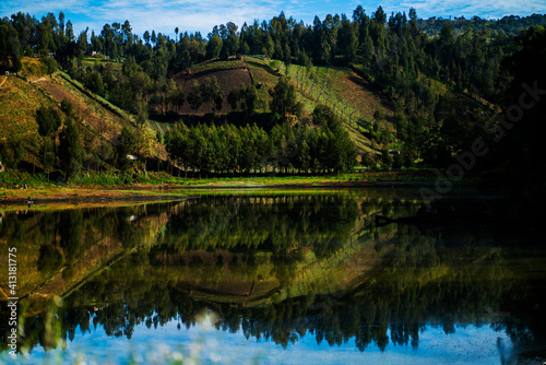 Ranu Kumbolo Lake located in mount semeru, East Java, Indonesia. Ranu kumbolo is a holy lake for tengger people. This lake is very beautiful in the morning.  photo