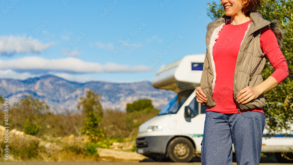 Woman enjoy trip with motorhome