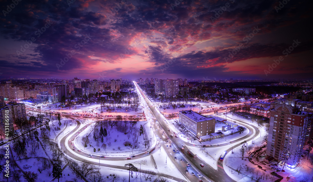 Traffic interchange in the night city. Top view.