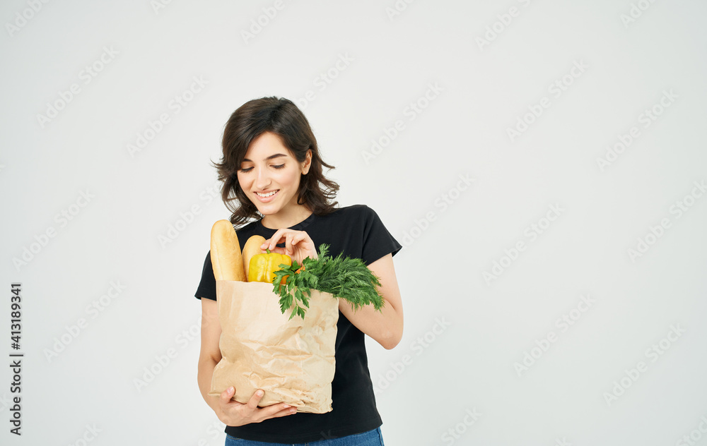 Woman with package of healthy diet food household shopping in store Woman with package of healthy diet food household shopping in store