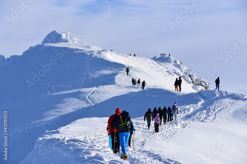 Kasprowy Wierch mountain, winter in the Tatras, tourists and skiers © Albin Marciniak