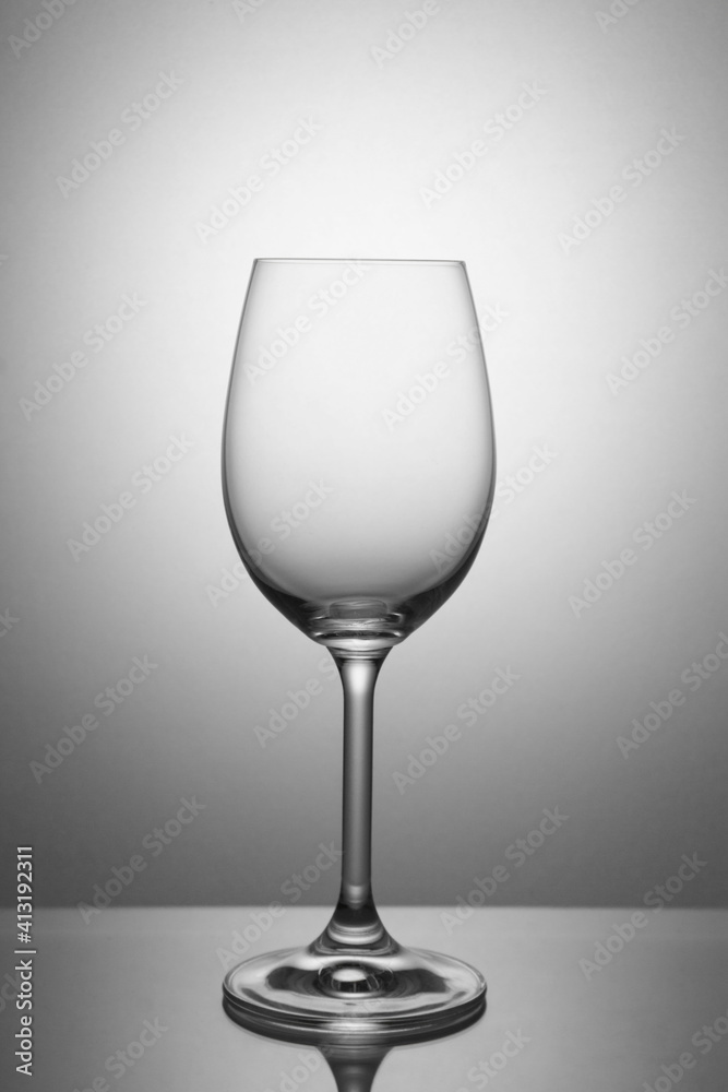 Empty wine glass for white wine on a white background. Empty wine glass for white wine on a white background.