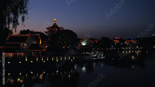 Suzhou, China - May 18, 2020: Night view in of Shantang Street in Suzhou. Ancient Water Town. Famous Chinese tourist destination. photo