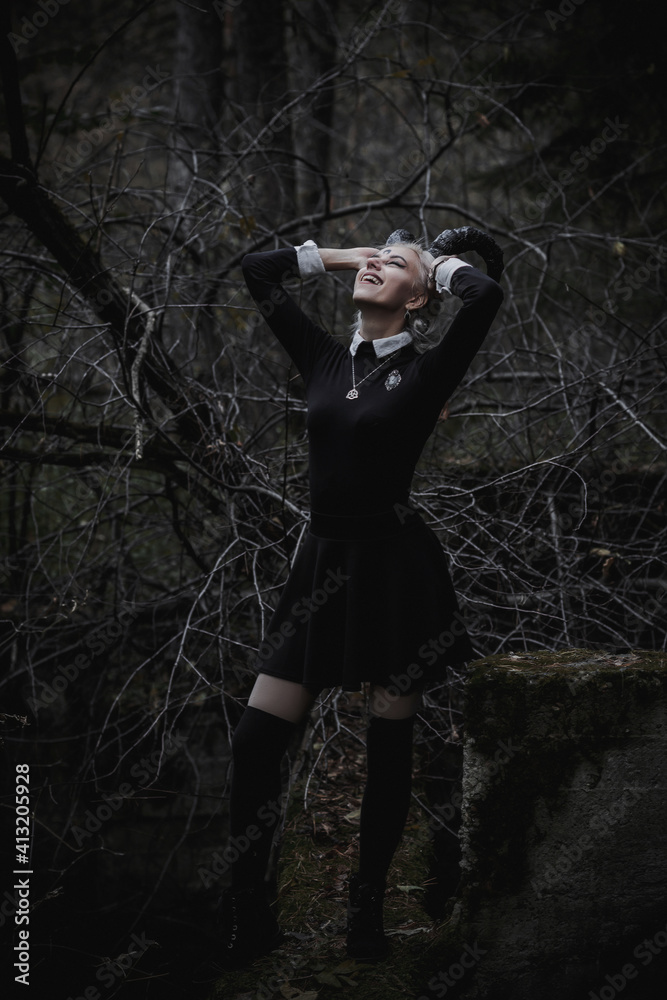 Naklejka premium Witch in the form of a student in the forest