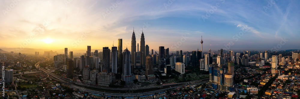 High Angle View Of City Against Sky During Sunset