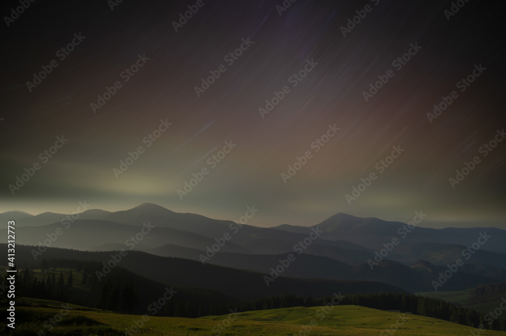 Beautiful starry sky in the Ukrainian mountain village in the Carpathians