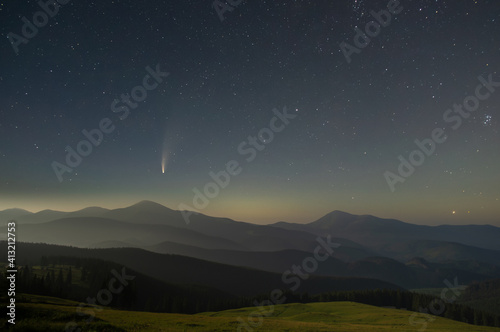 Beautiful starry sky in the Ukrainian mountain village in the Carpathians