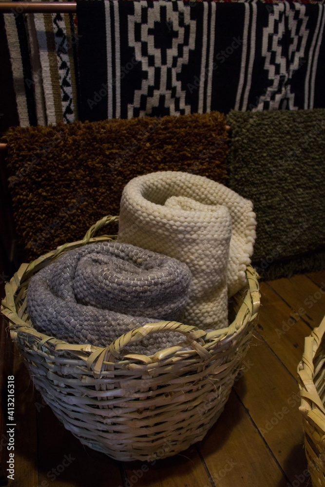 Obraz premium basket and blankets on a table
