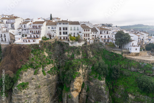 view of the narrow and deep El tajo Gorge in Ronda in Andalusia