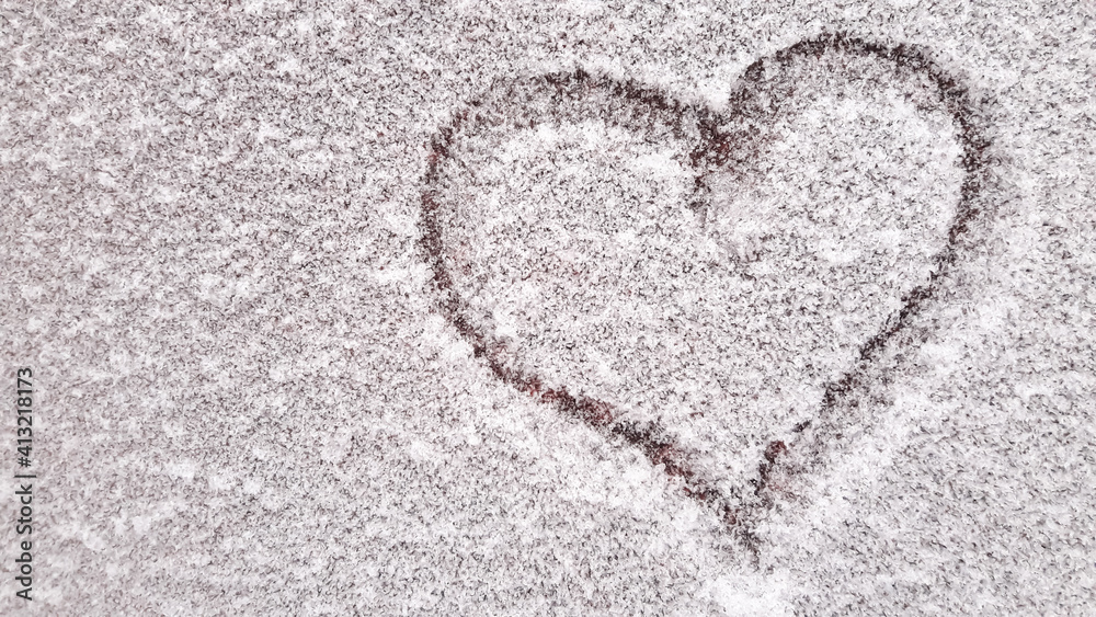 Heart drawn with a finger on the iron surface of hoarfrost. A suitable background of frost on the iron. Copy the space to the left. Heart painted on the surface of frost Heart drawn with a finger on the iron surface of hoarfrost. A suitable background of frost on the iron. Copy the space to the left. Heart painted on the surface of frost