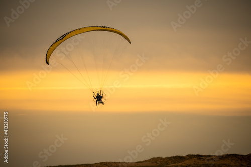 paragliding in the sunset