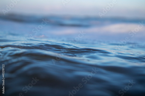 фотографія Morning Sunlight Reflecting On Ocean Water in North sea, low water surface angle