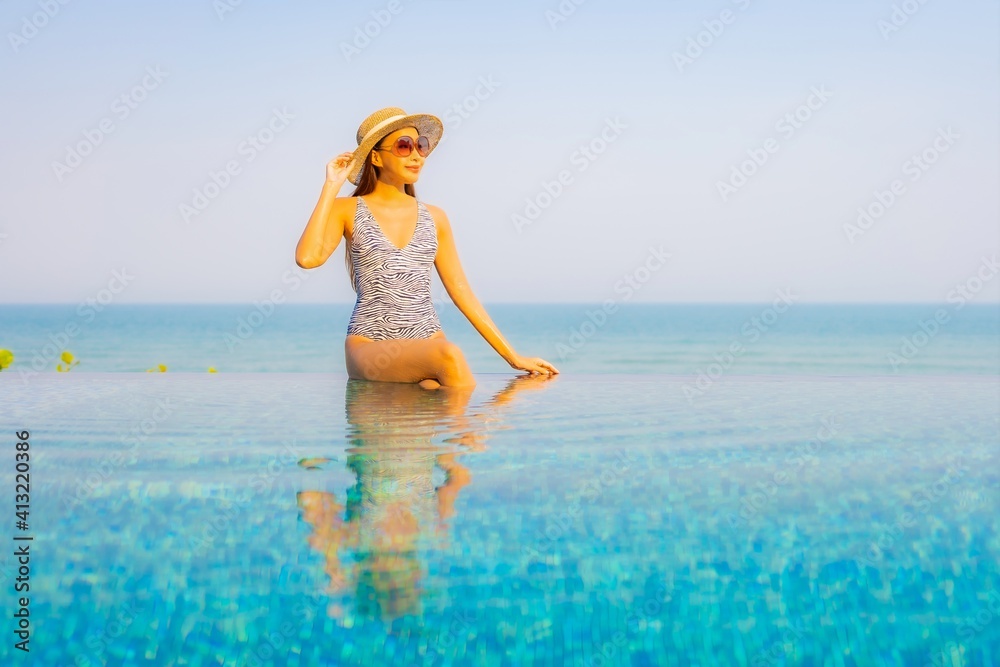 Portrait beautiful young asian woman relax smile enjoy leisure around swimming pool Portrait beautiful young asian woman relax smile enjoy leisure around swimming pool
