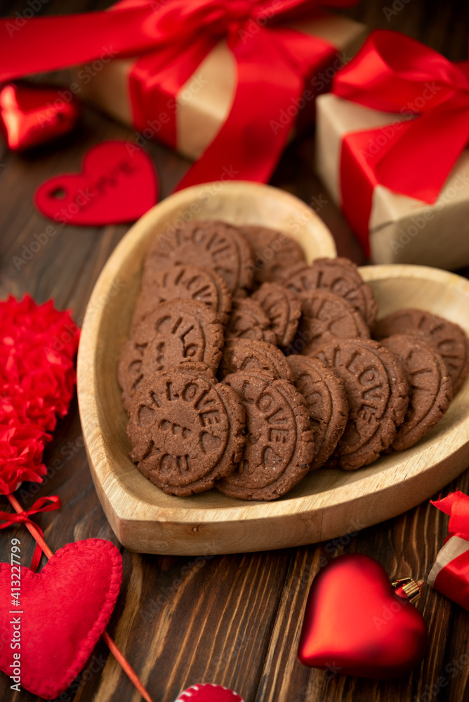 Valentines day greeting card with chocolate cookies, gift box and felt hearts. I love you sign. Top view. Flat Valentines day greeting card with chocolate cookies, gift box and felt hearts. I love you sign. Top view. Flat