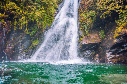 Milky Bhagsunag waterfall at McLeod Ganj in Dharamsala, Himachal Pradesh, India photo