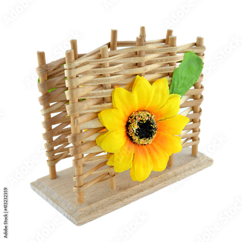 Wooden napkin holder on a white background. photo