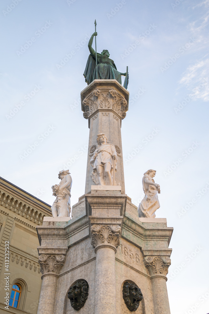 Helvetian confederation statue in Bern with shield and lance