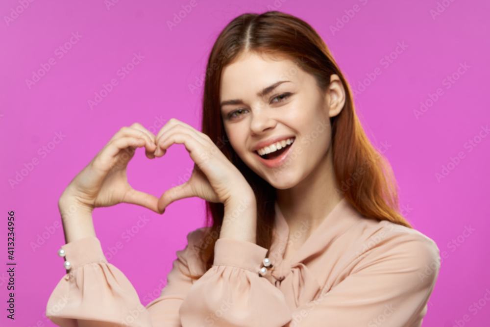 pretty woman gesturing with hands glamor fashion fun pink background close-up pretty woman gesturing with hands glamor fashion fun pink background close-up