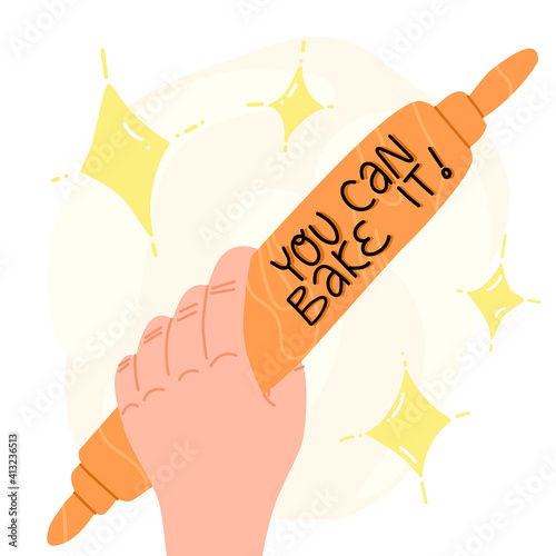 A person's hand holding rolling pin, motivational lettering You can bake it. A beginner baker, chef, pastry maker slogan