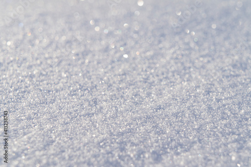 Light texture of winter snow close up