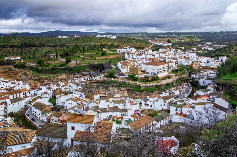 Traditional white village in inland of Spain. It's called Pueblos Blancos in spanish. White houses on the rocks.