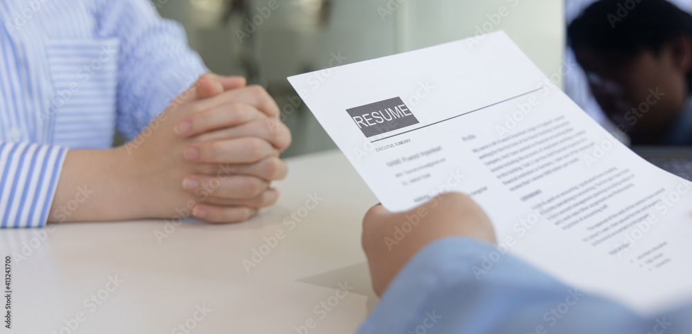 Employer or selection committee is reading the candidate's resume and competence background, Job interview by HR, History exam and work ability, Employment and Recruitment Concept... Employer or selection committee is reading the candidate's resume and competence background, Job interview by HR, History exam and work ability, Employment and Recruitment Concept...