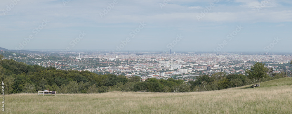 ArchitViews from Wiener Blick viewpoint up in the hilly forested mountains of Vienna City in Austria.ecture of Vienna City in Austria.