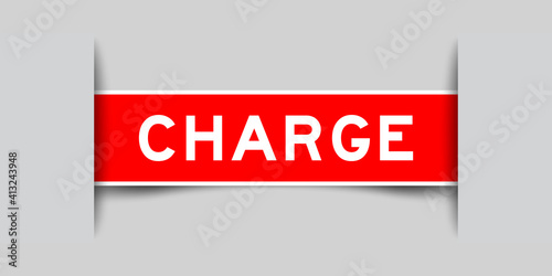Label sticker red color in word charge that inserted in gray background