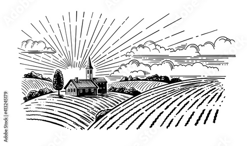 village with fields and sun