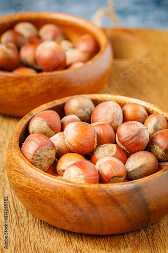 hazelnuts in a wooden bowl