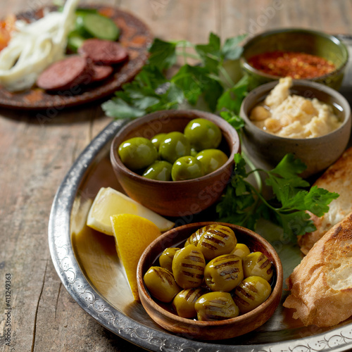 Healthy Mediterranean breakfast with grilled green olives