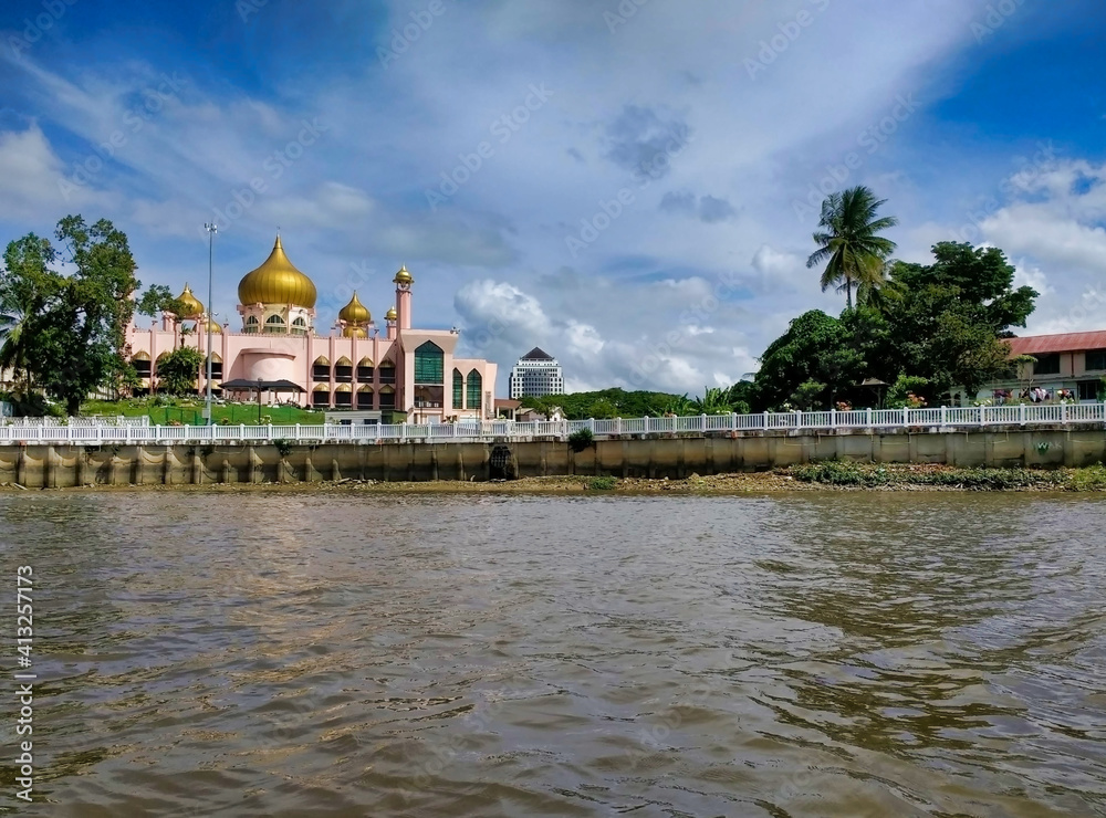 View of Kuching City Mosque from the river. City Waterfront. Borneo Island. Sarawak. Malaysia. South-East Asia