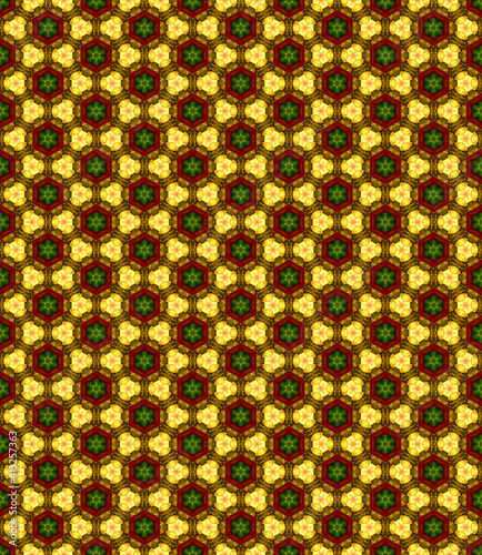 A blurry pattern of geometric shapes on a yellow background