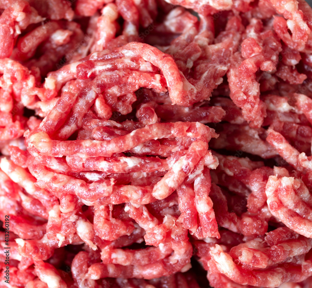 Background minced meat red with white streaks of fat. Background minced meat red with white streaks of fat.