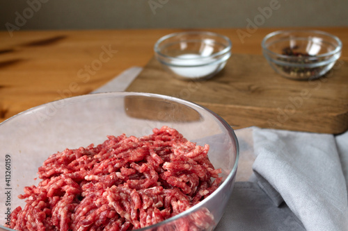 Ground beef meat from fresh meat salt and pepper for cooking cutlets.