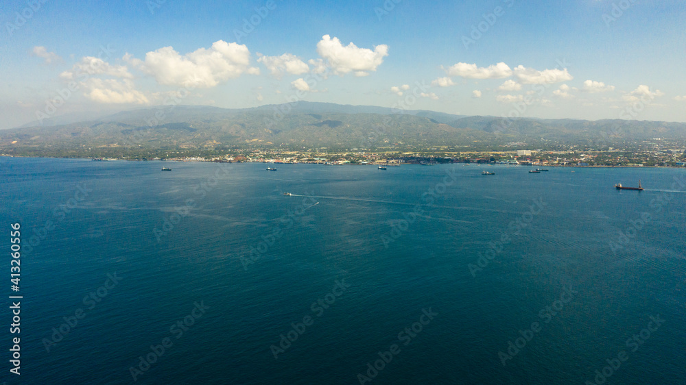Aerial view of Zamboanga city with its seaport and ships. Commercial and industrial center of the Zamboanga Peninsula Region. Mindanao, Philippines.