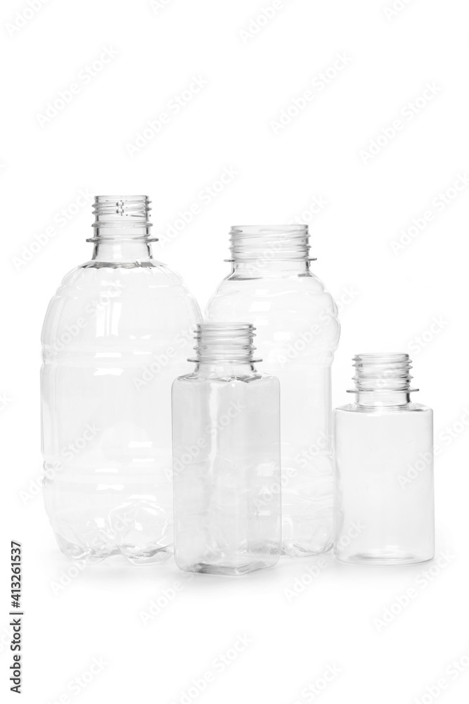 many different empty plastic bottles isolated on white background. many different empty plastic bottles isolated on white background.