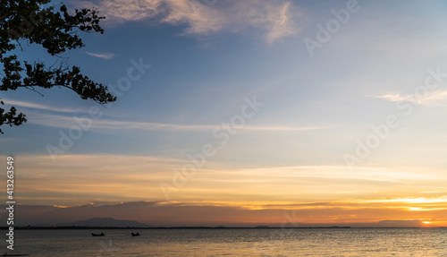 Sunset sky over sea in the evening with colorful sunlight, dusk sky