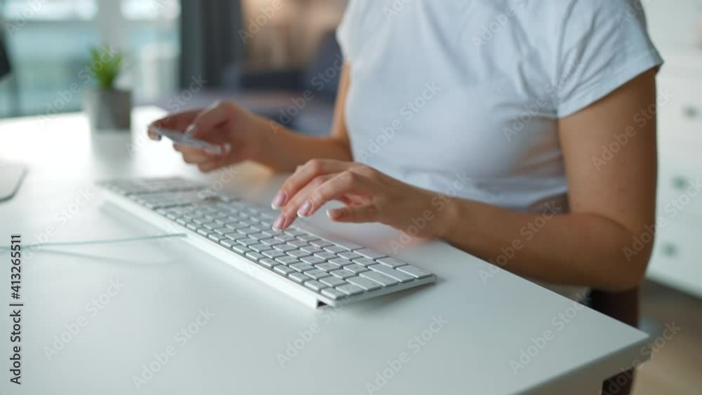 Female hands typing credit card number on computer keyboard. Woman making online purchase. Online payment service. Female hands typing credit card number on computer keyboard. Woman making online purchase. Online payment service.