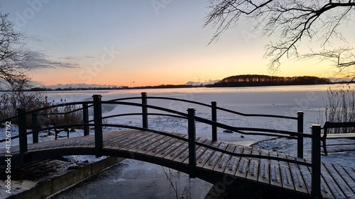 Sunset at icy lake