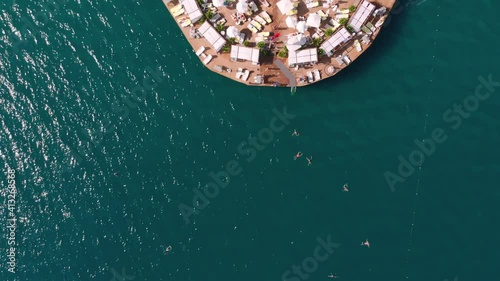 Exclusive relaxation on the luxury hotel pier in the Mediterranean. A wonderful vacation with your best friends with party and club entertainment