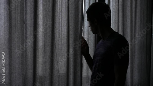 Man looking out of the window