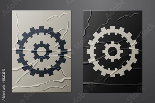 White Bicycle cassette mountain bike icon isolated on crumpled paper background. Rear Bicycle Sprocket. Chainring crankset with chain. Paper art style. Vector.