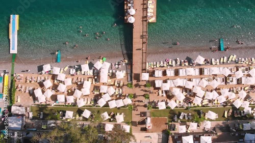 Exclusive relaxation on the luxury hotel pier in the Mediterranean. A wonderful vacation with your best friends with party and club entertainment