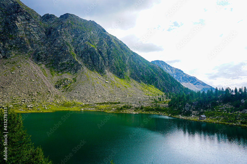 Panoramic view over the Lago di Mognola in the Swiss Alps