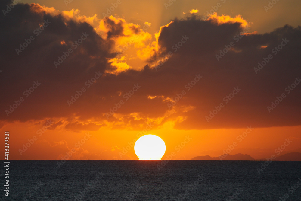 Sea sunset close up with big sun