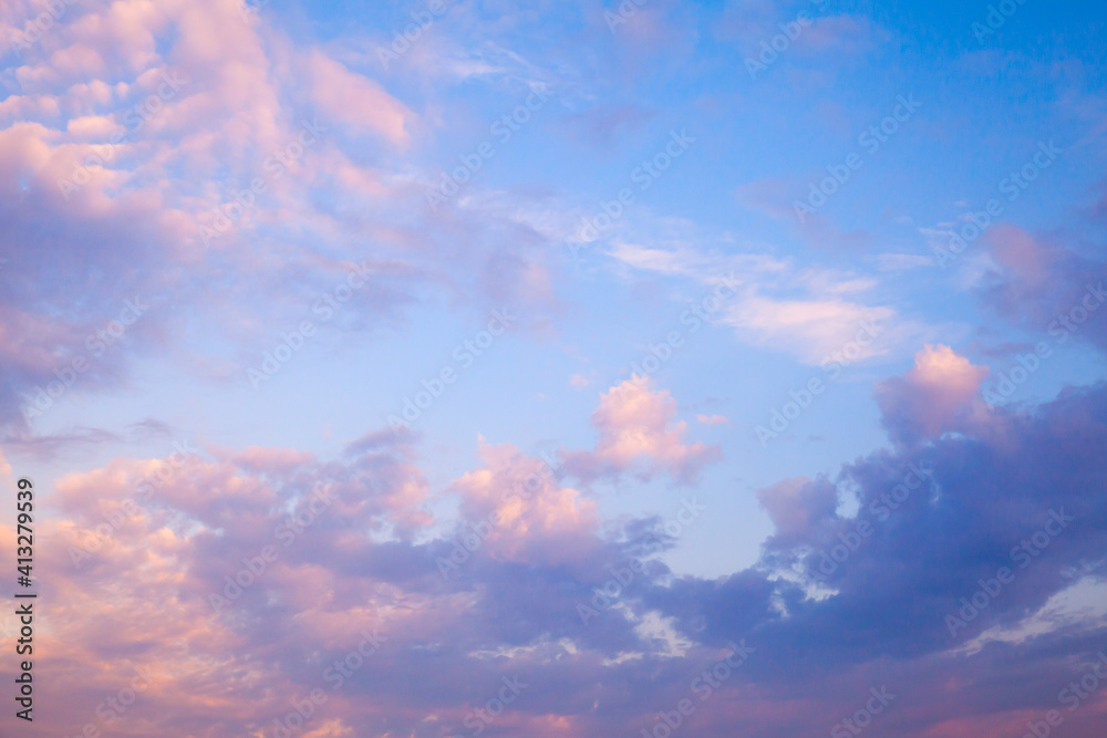 Colorful sky with pink clouds at sunset