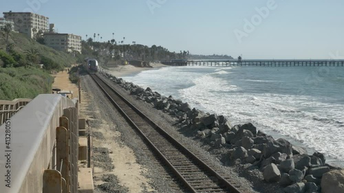 Pacific surfliner train moving away at coast Orange County San Clemente Linda Lane Park California USA
