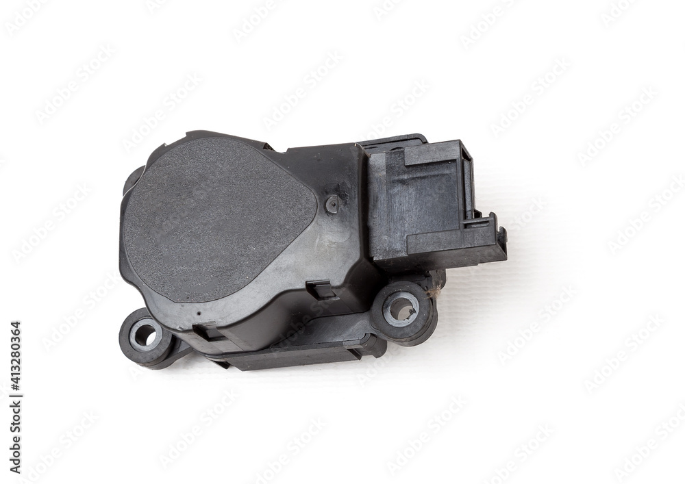 Obraz premium Heater flap motor - spare part and element of car air conditioning system for directing air into the car interior on white isolated background. Auto service industry. Spare parts catalog.
