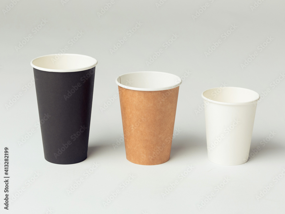Coffee cup set - mockup template for cafes, design of the restaurant's corporate style. Black, white, brown cardboard coffee cup mockup. Template disposable plastic and paperware for hot drinks Coffee cup set - mockup template for cafes, design of the restaurant's corporate style. Black, white, brown cardboard coffee cup mockup. Template disposable plastic and paperware for hot drinks